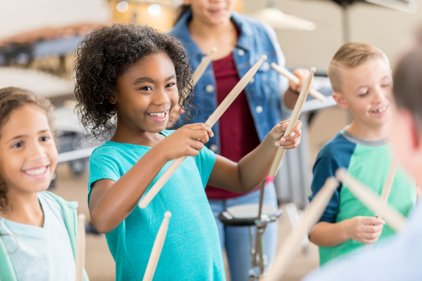 group of children drumming