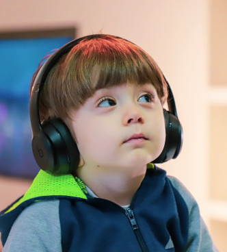 autistic boy with headphones