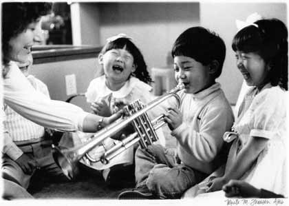 Children playing trumpet