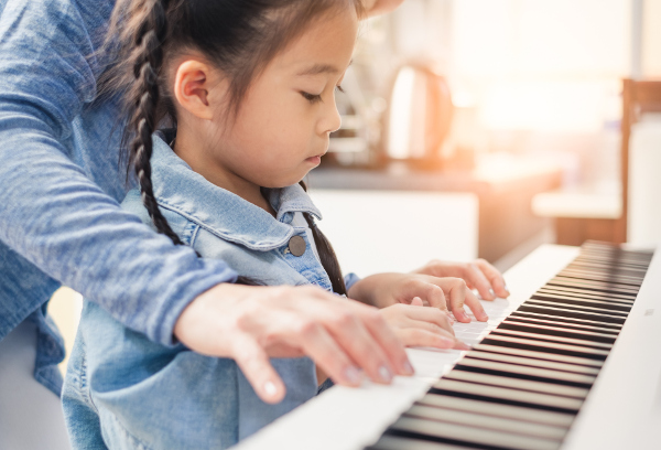 Girl plays piano